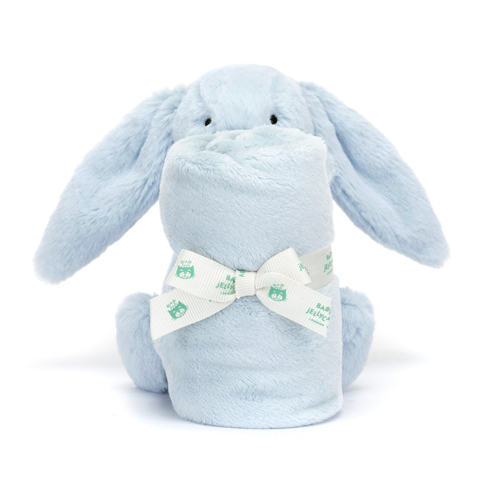 Blue plush bunny toy with a rolled blanket tied with a logo-printed ribbon.