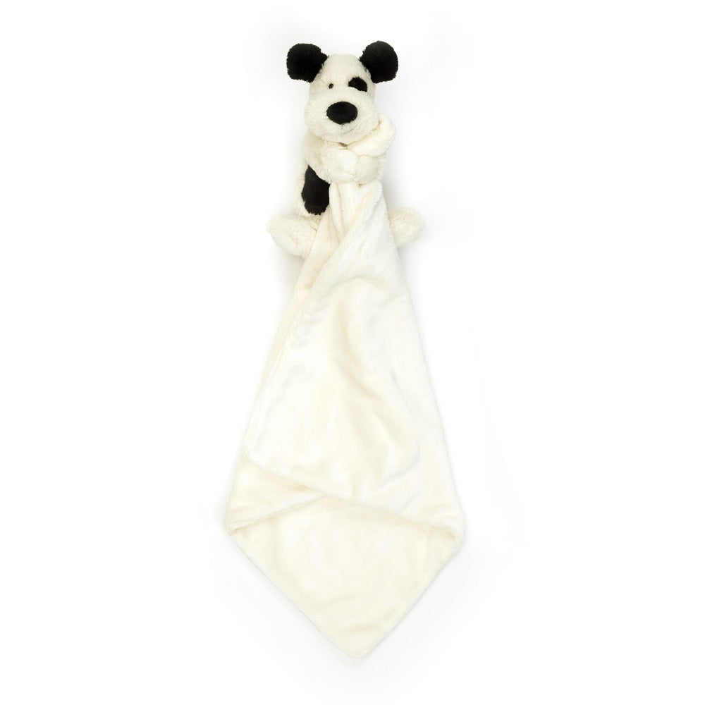 Black and white stuffed puppy comfort blanket.