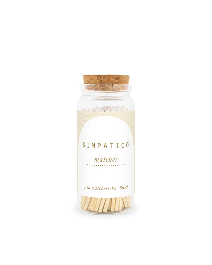 Jar of matches labeled 'Simpatico' on a white background