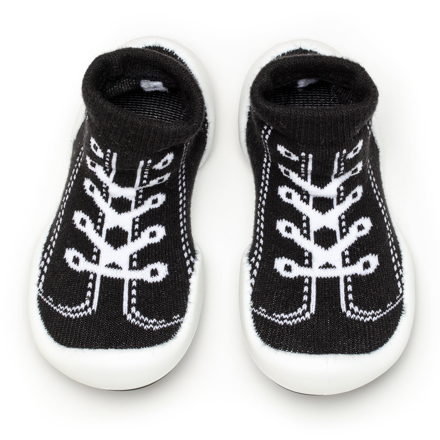 Two black and white baby sock-shoes.