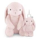 Two pink bunny plushies, one with a keychain attachment.