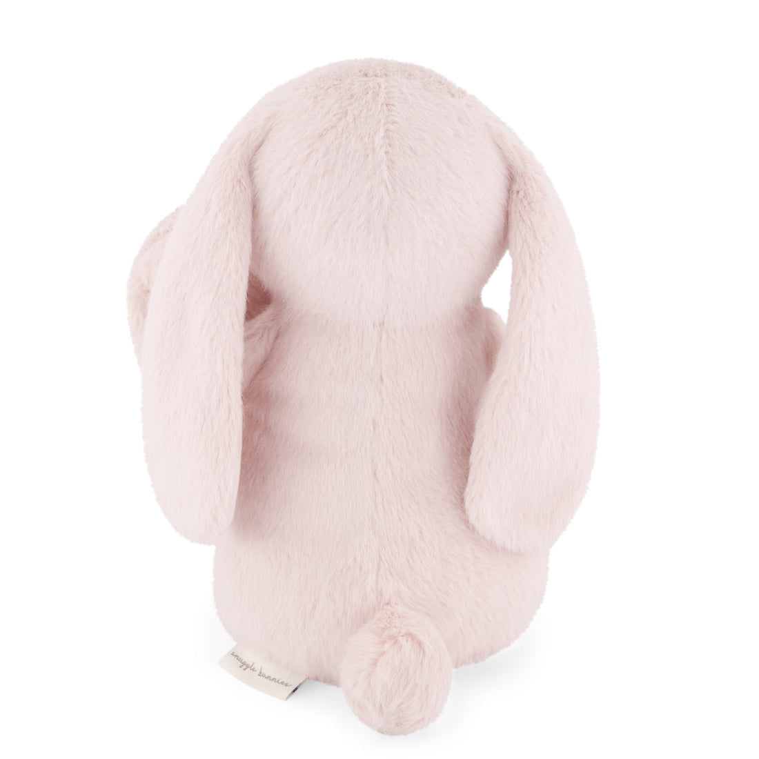 Rear view of a pink plush bunny with long ears and a small tail.