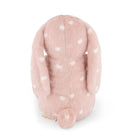 Pink plush rabbit with white heart pattern, back view.