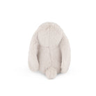Back of a fluffy, light gray stuffed bunny.