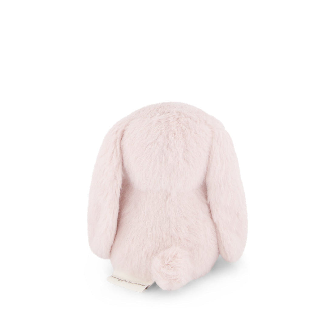 Back view of a small, pink, stuffed bunny.