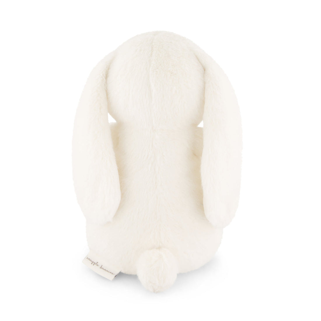 Rear view of white plush bunny.