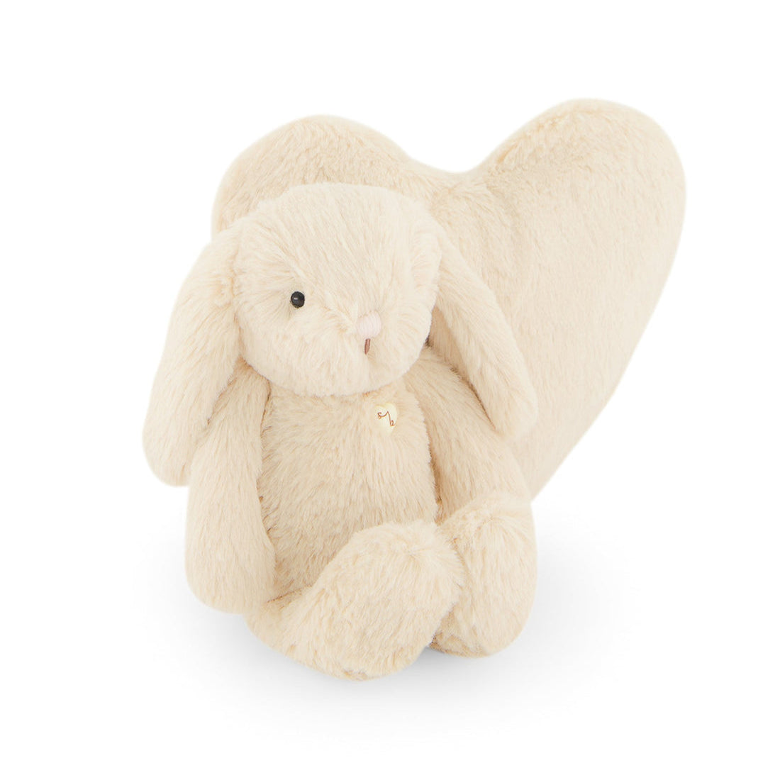 Beige bunny plush toy with heart.
