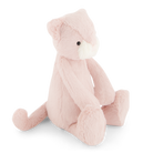 Pink plush toy cat sitting.