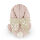 Back view of a pink plush bunny with gold wings and a fluffy white tail.