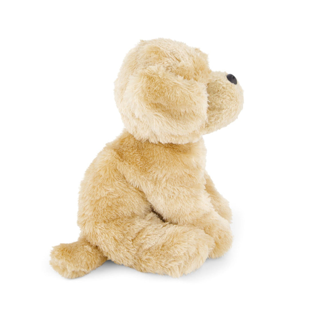 Tan plush toy dog sitting.
