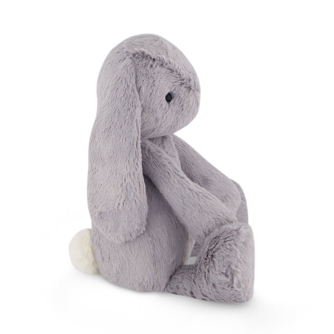 Gray stuffed bunny toy sitting up.