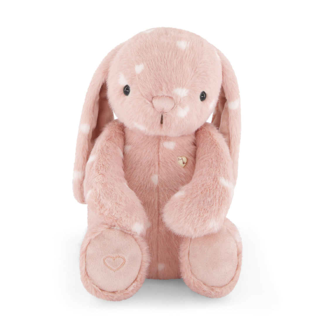 Pink plush bunny with white hearts.
