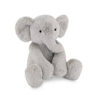 Grey stuffed elephant with floppy ears sitting on a white background.