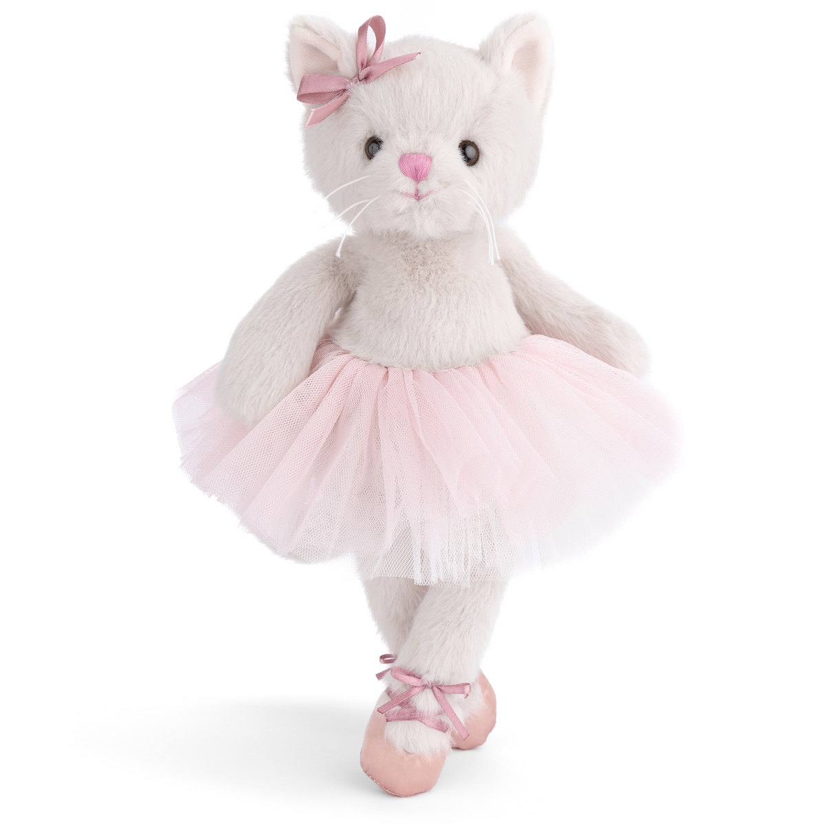 Plush toy cat in a ballerina outfit with a pink bow on a white background