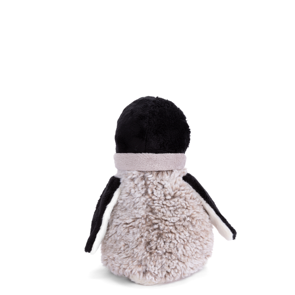 Plush toy penguin with a black head and white body on a white background