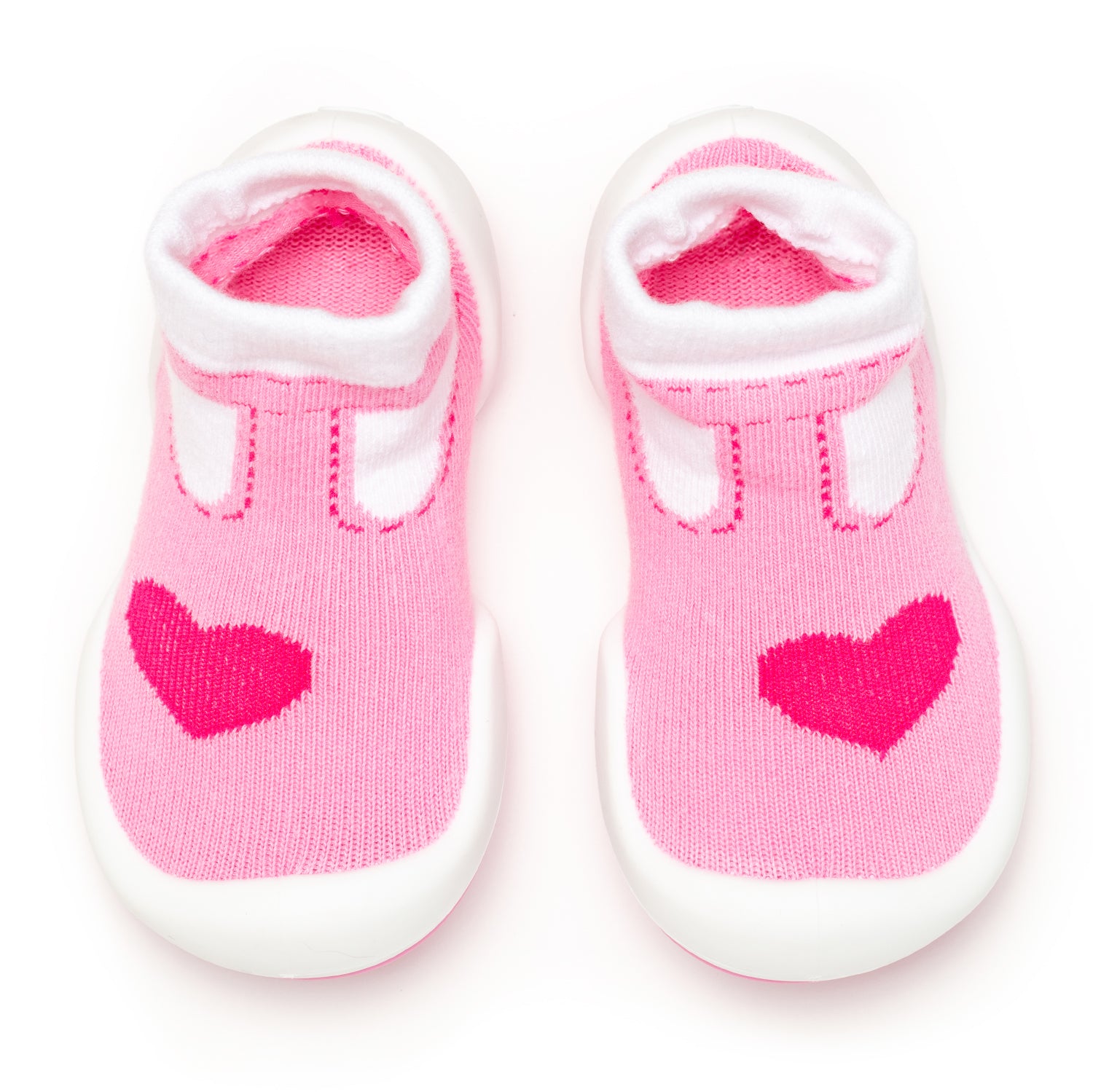 Pair of pink baby sock shoes with hearts.