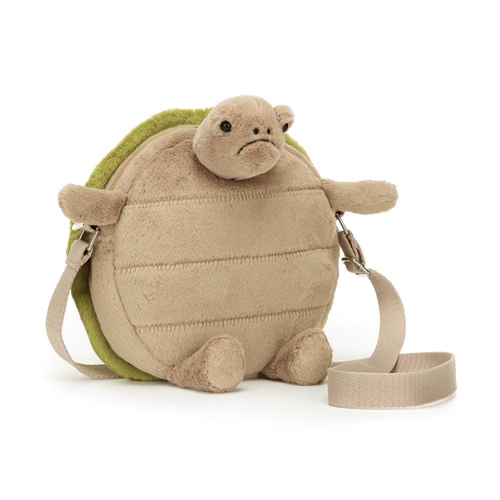 Stuffed turtle purse with shoulder strap.