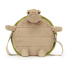 Tan plush turtle purse with green shell and shoulder straps.