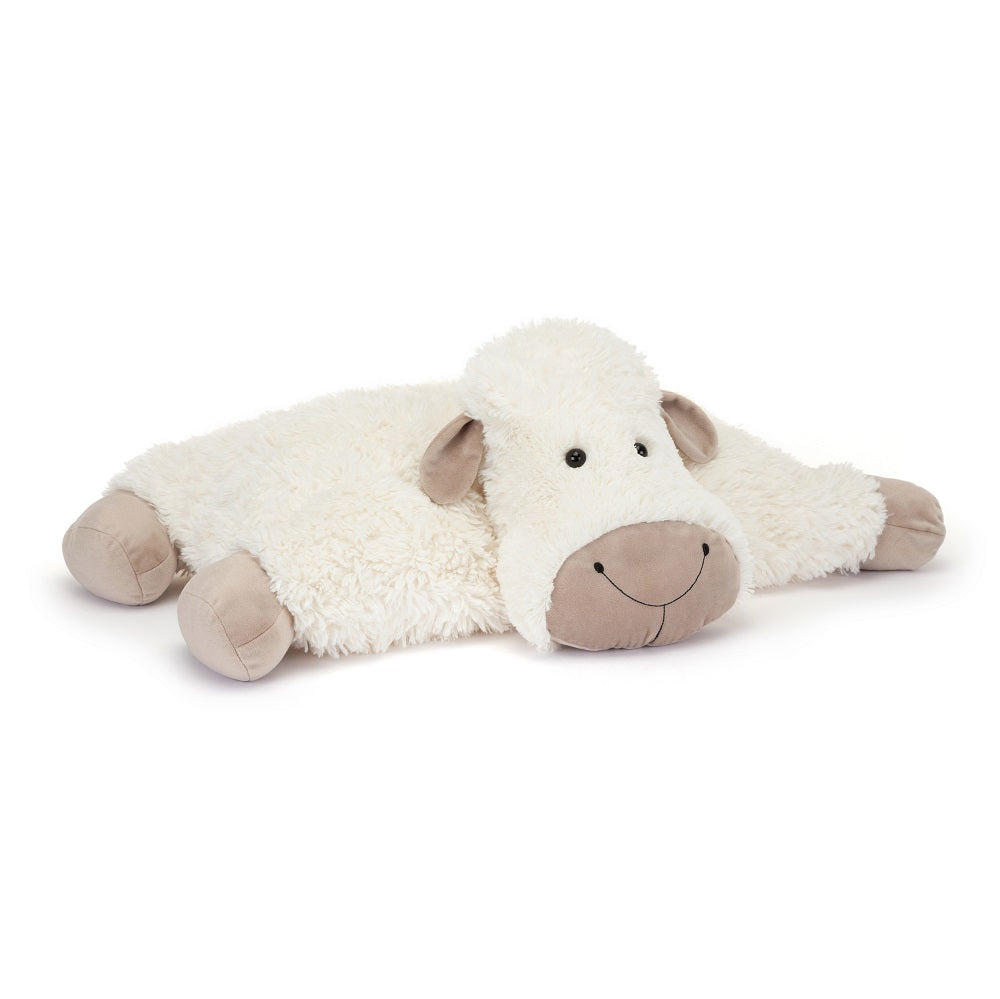 White plush sheep laying down.