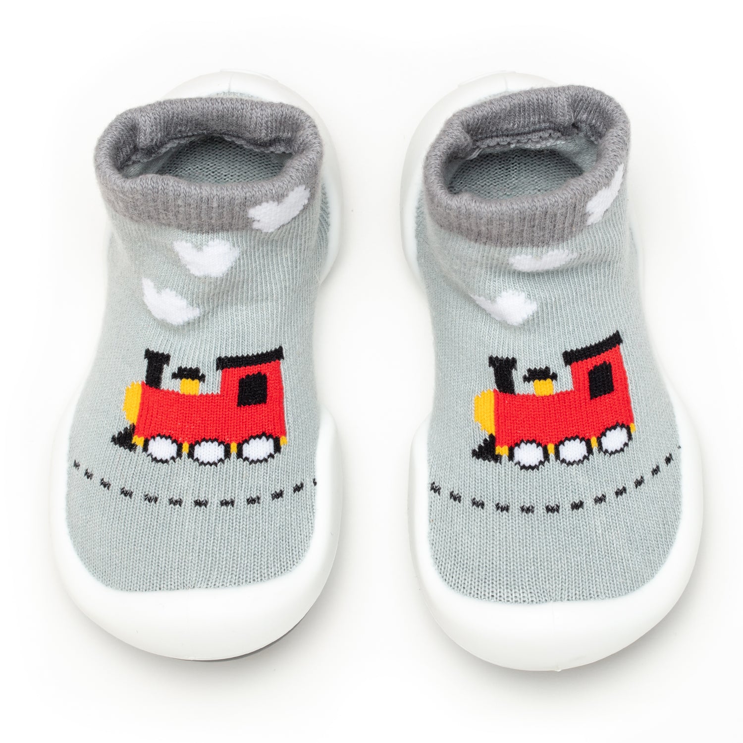 A pair of gray and white train-themed baby sock shoes.