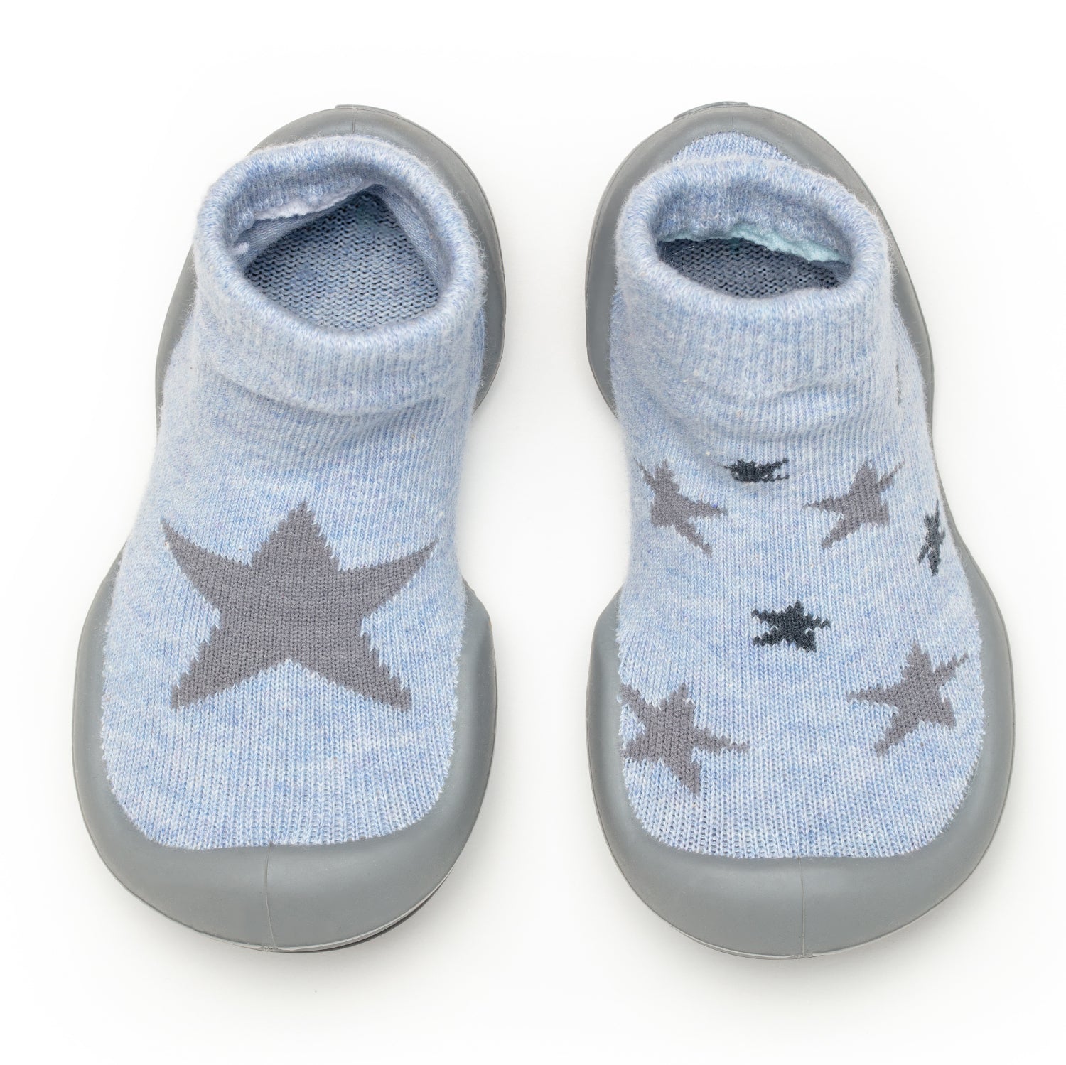Pair of blue and gray baby sock shoes with star pattern.