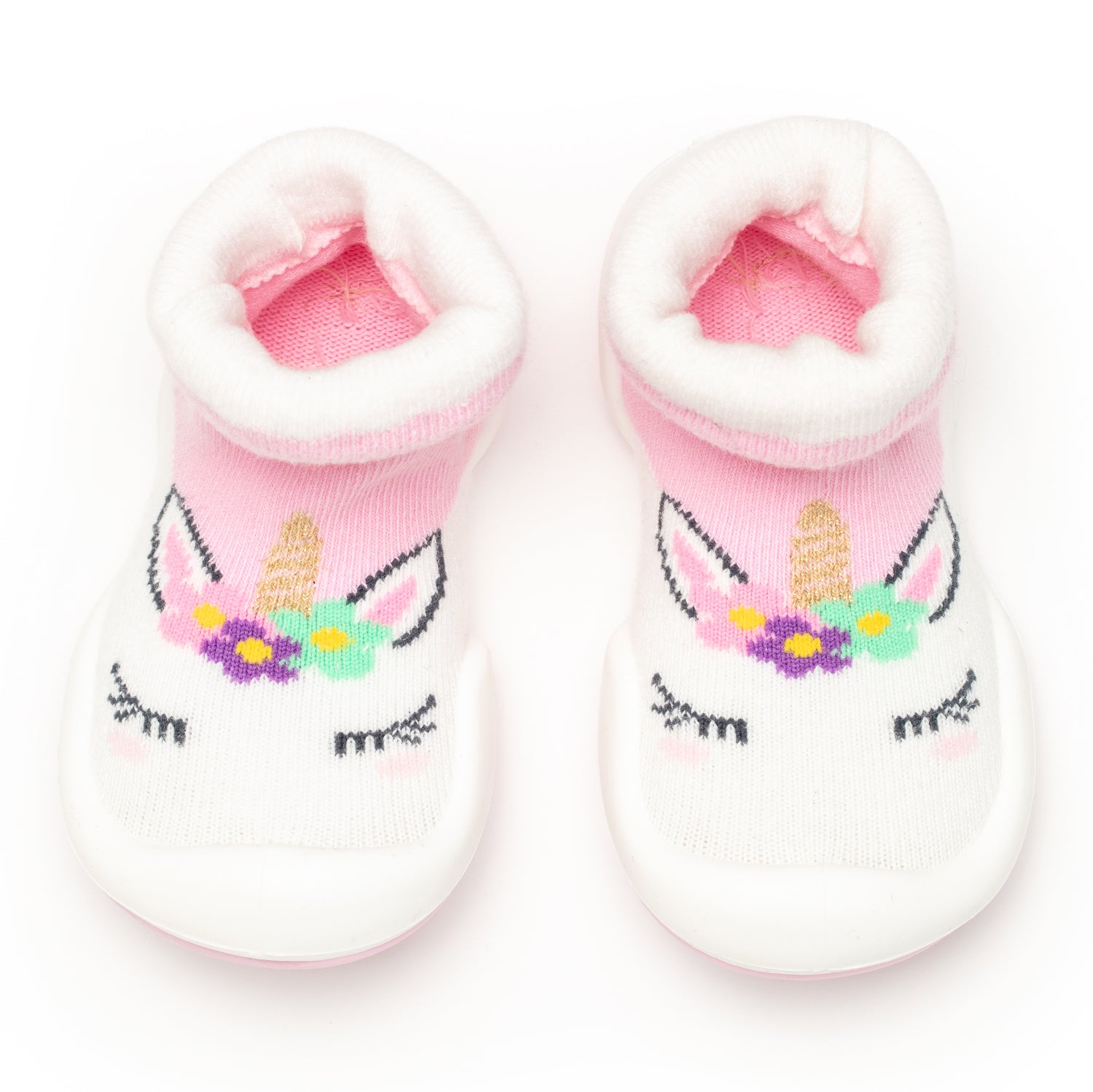 Pink and white unicorn baby shoes.