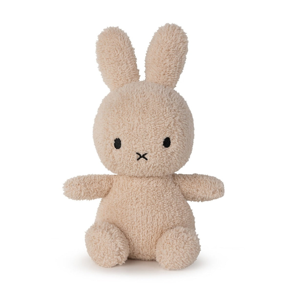 Beige plush bunny toy with black stitched eyes and mouth, sitting upright.