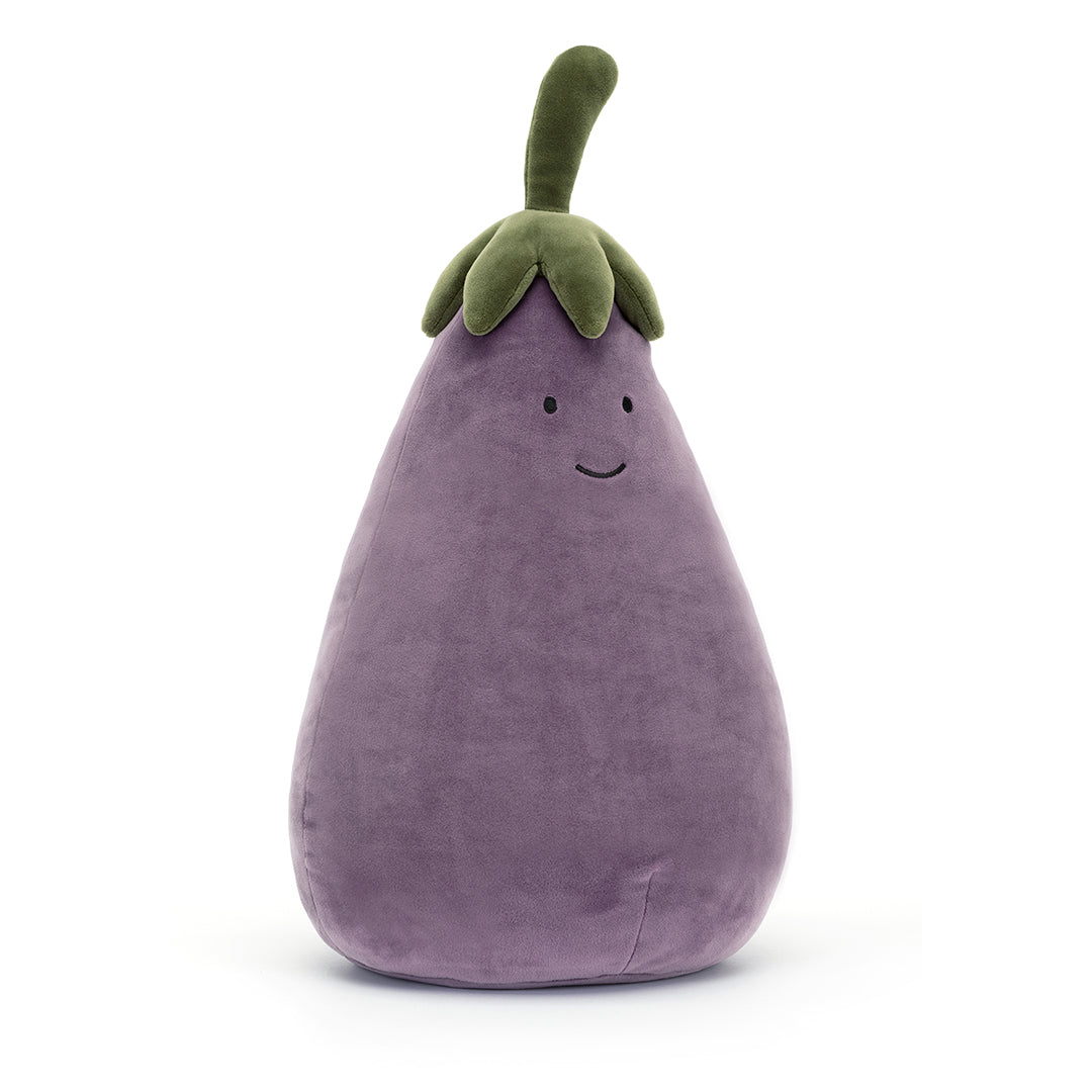 A plush eggplant toy with a small, smiling face.