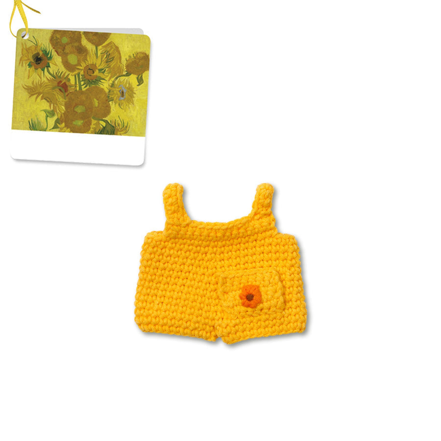Knitted yellow baby shorts with sunflower and Van Gogh painting.