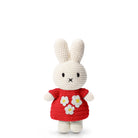 Crocheted Miffy doll in a red dress with white flower appliques.