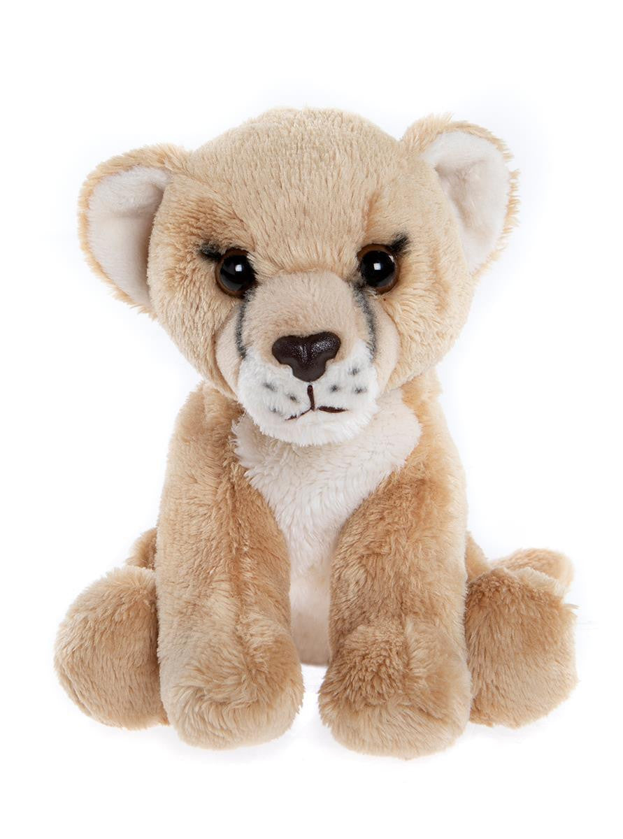 Plush toy lion cub on a white background