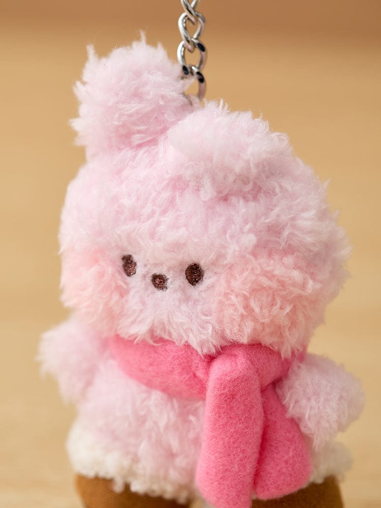 Pink plush keychain with scarf.