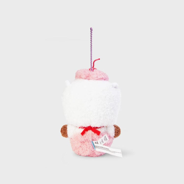 Back view of a plush toy with a pink beret, pink outfit, and a silver chain.