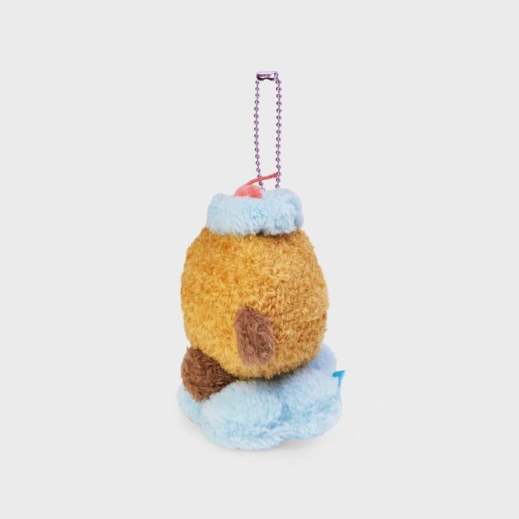 Plush keychain with brown and blue plush toy.