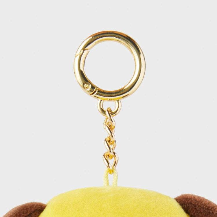 Close-up of a plush keychain with a gold clasp and chain.