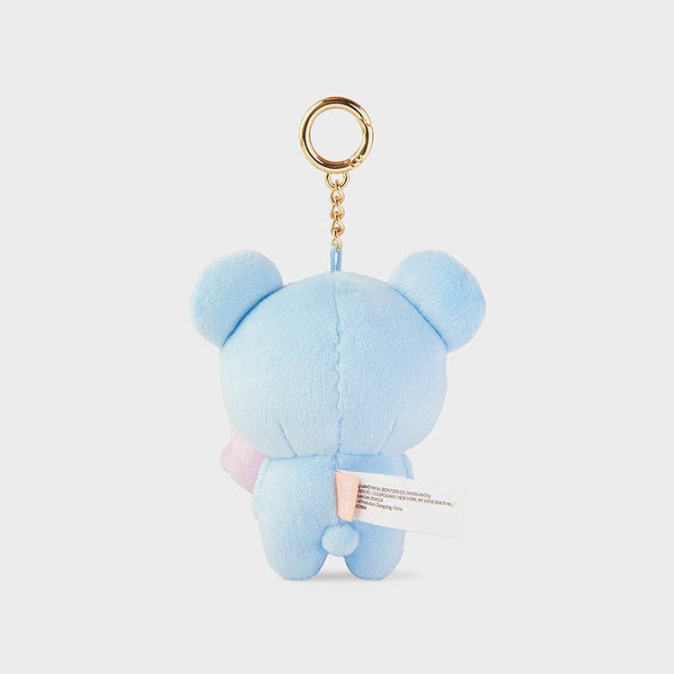 Rear view of a blue plush bear keychain.