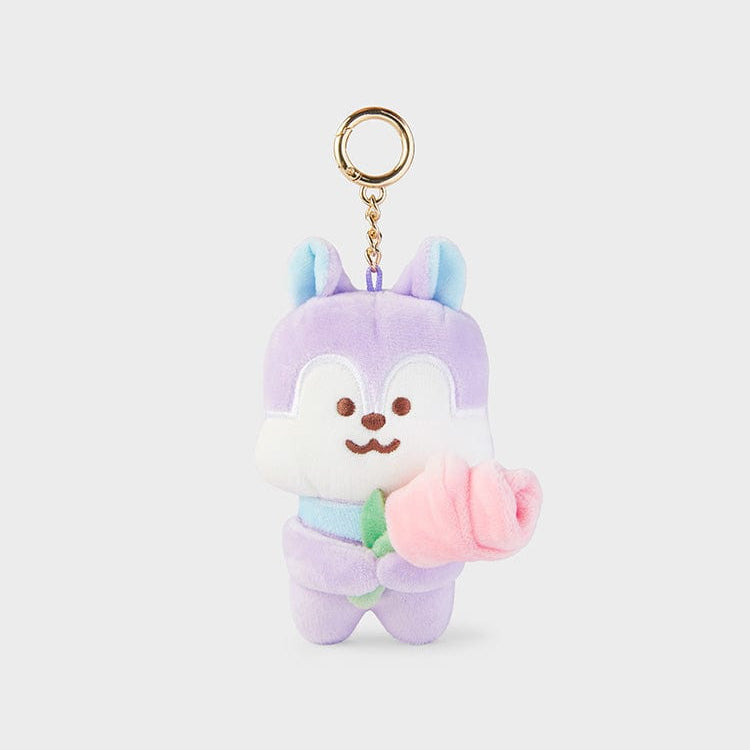 Purple and white plush doll with a gold keychain holding a pink rose.