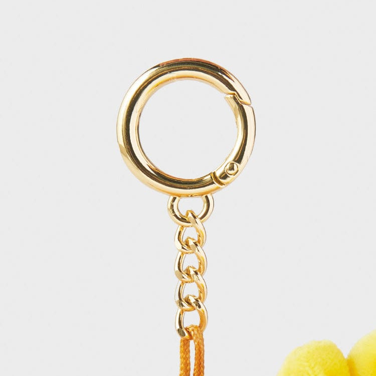 Gold clasp with chain and orange cord.