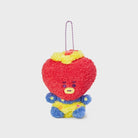 Red, heart-shaped, plush BT21 character keychain. It has a yellow ruffle around its neck and is wearing blue and yellow clothes.