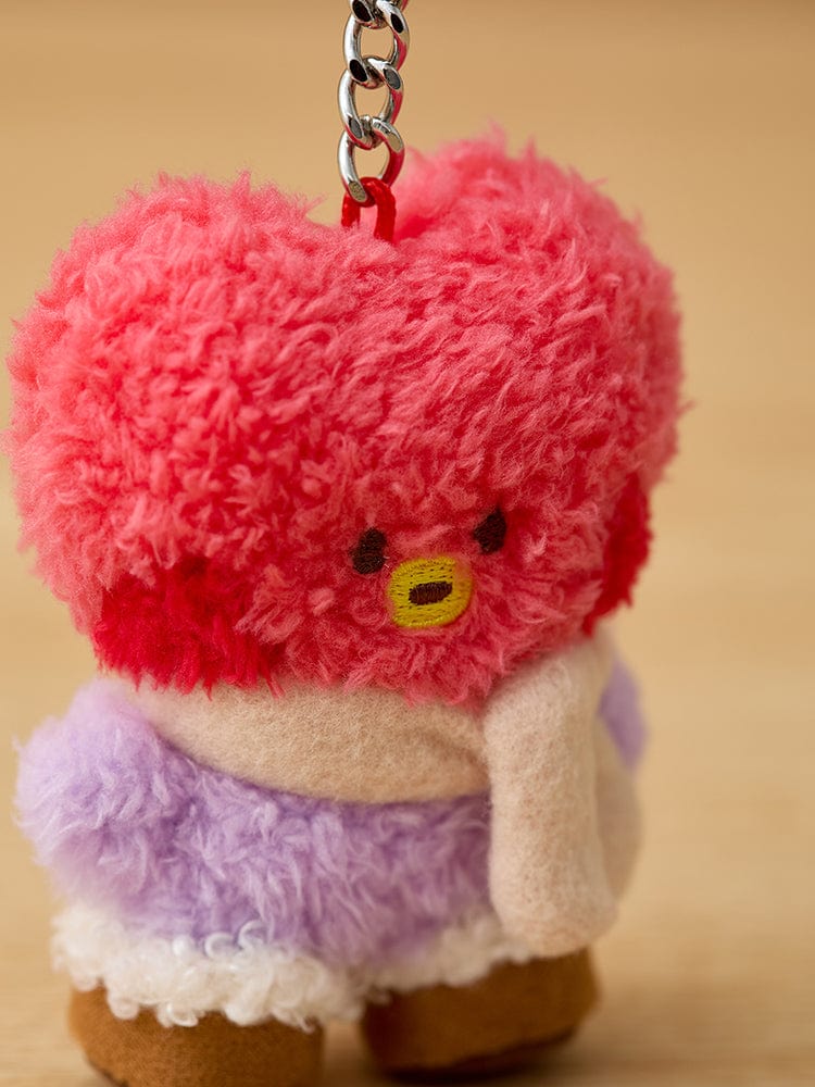 Plush red heart-shaped character keychain with purple coat and scarf.