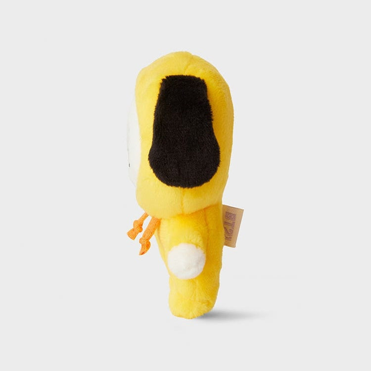 Side view of a yellow plush toy wearing a hoodie with a black ear.