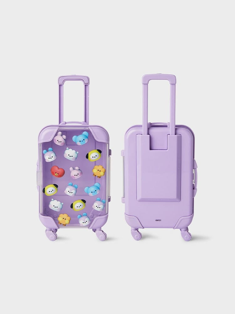 Two lavender suitcases, one with a clear front panel filled with small colorful cartoon character figures.