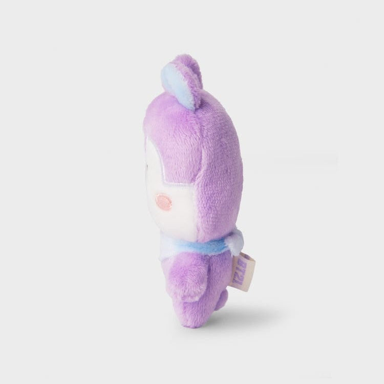 Side view of a purple plush toy with rabbit ears.