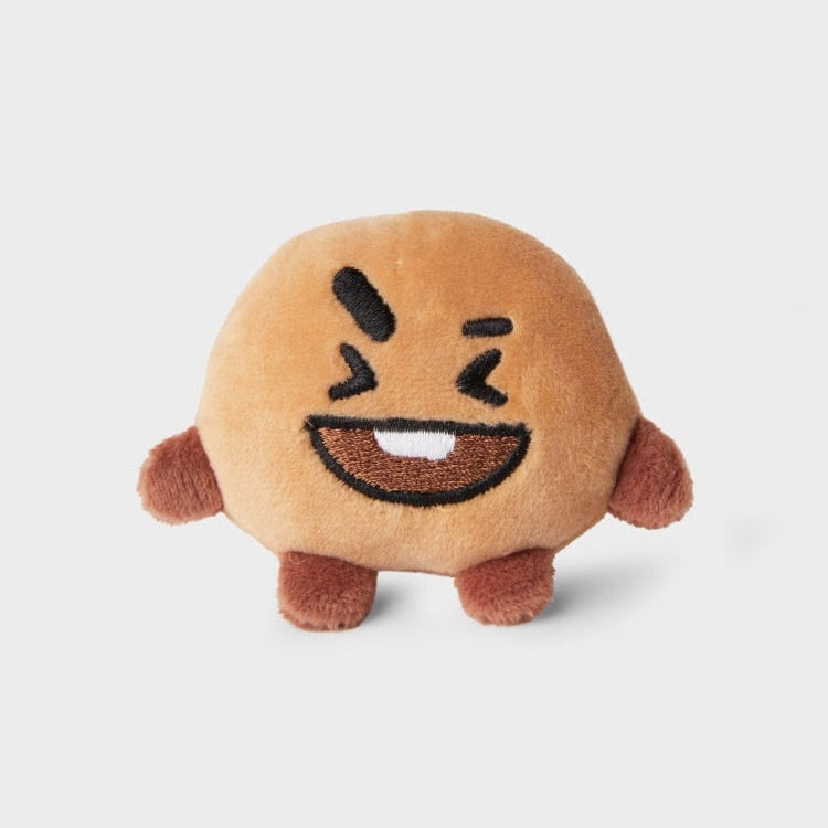 Brown BT21 Shooky plush toy with an embroidered face.