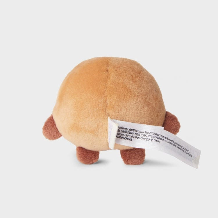 Brown, stuffed animal with a tag attached.
