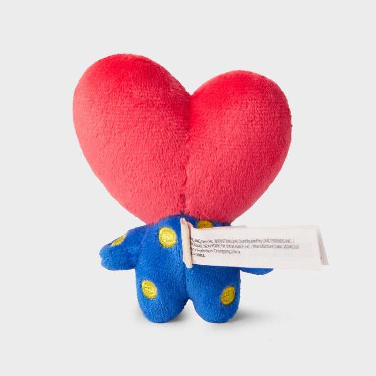 Plush toy with red heart-shaped head and blue body with yellow polka dots.