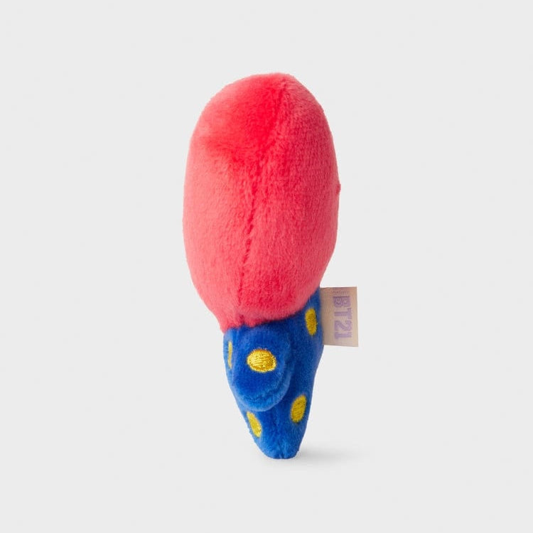 Plush toy with red top and blue polka-dotted bottom.