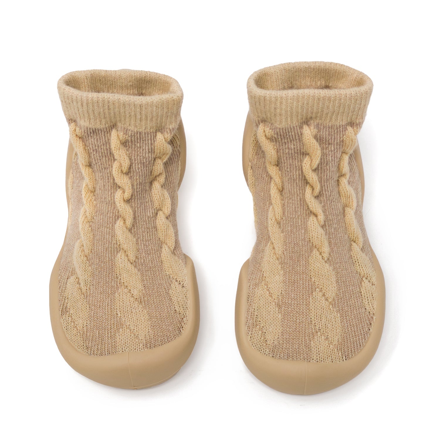 Two tan knit baby slipper socks with rubber soles.