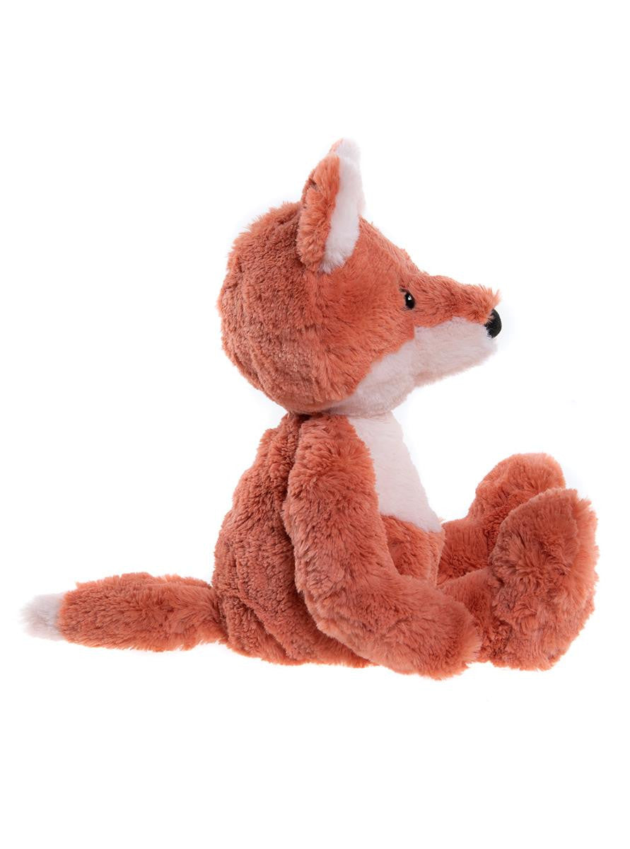 Plush fox toy on a white background