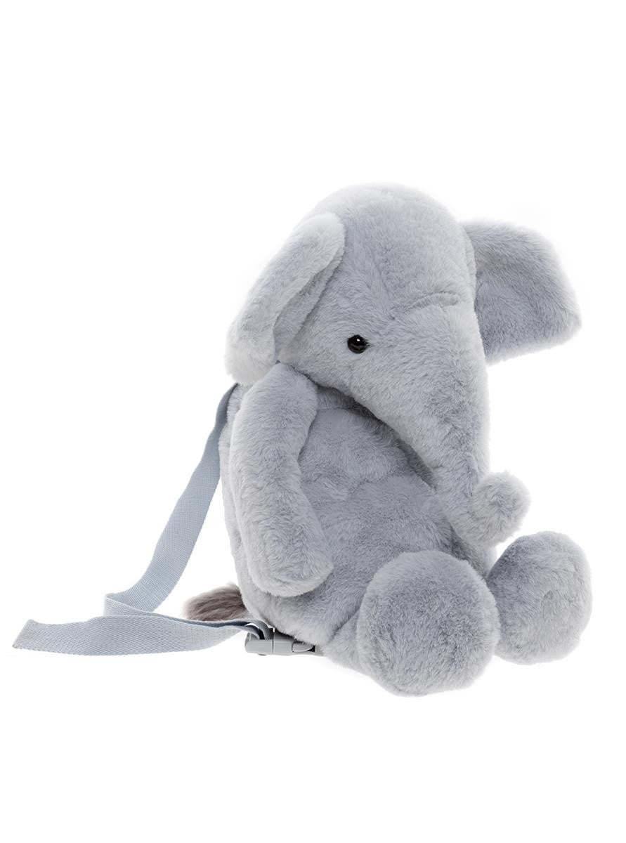 Gray plush elephant backpack on a white background